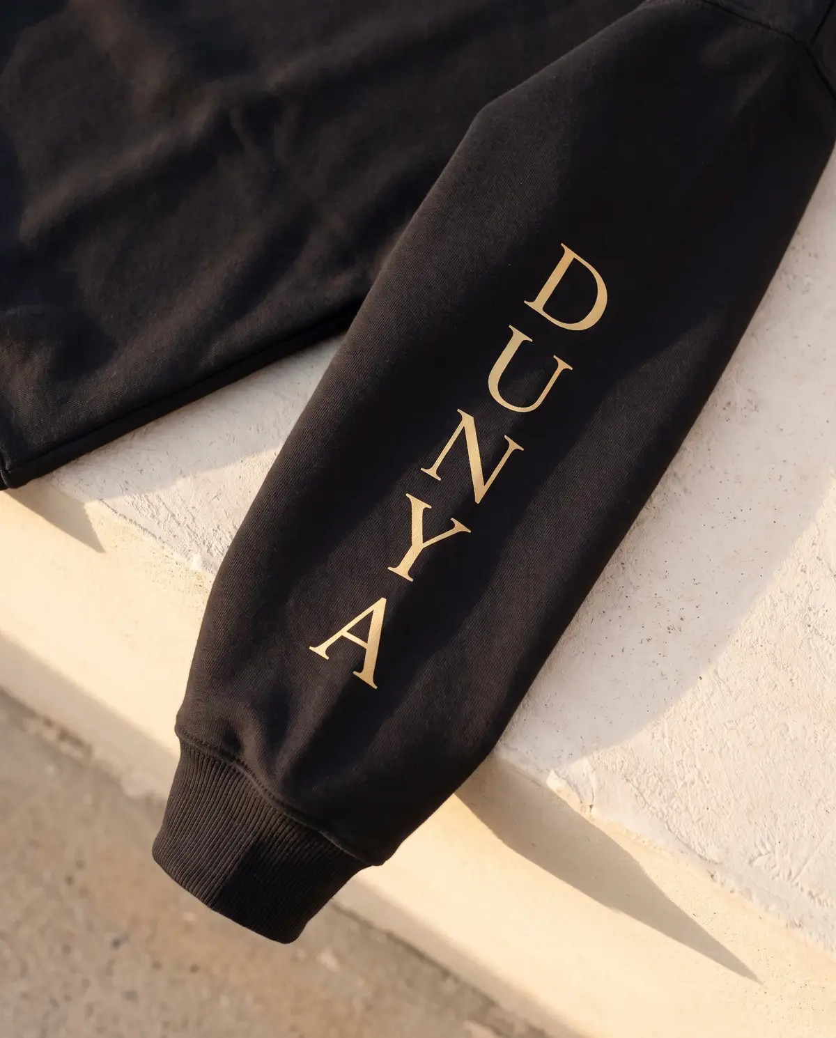 The Power of Dunya · Black · Sleeve