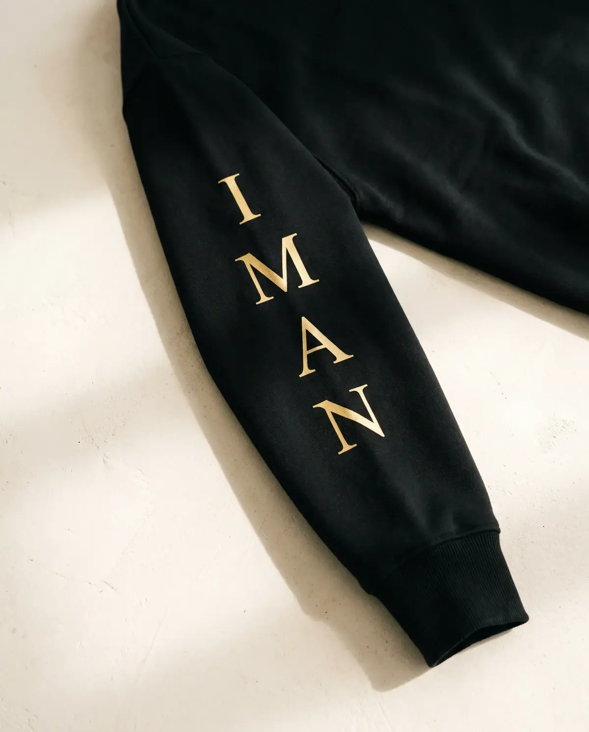 The Power of Iman · Black · Sleeve