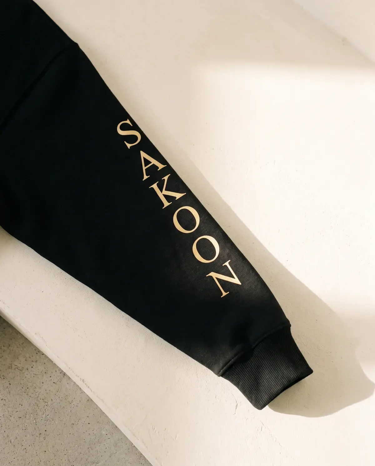The Power of Sakoon · Black · Sleeve