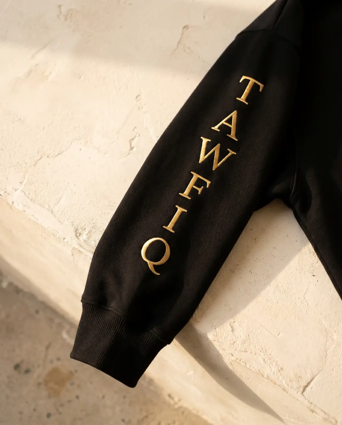 The Power of Tawfiq · Black · Sleeve